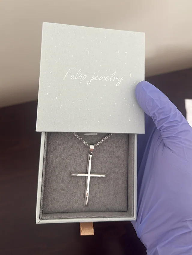 A custom cross pendant in a Fulop Jewelry box
