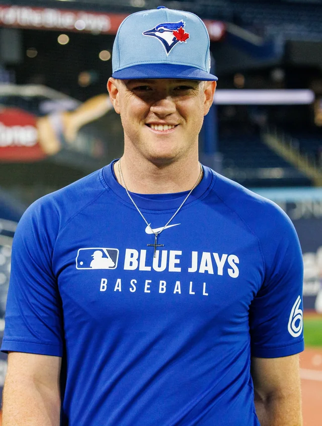 Toronto Blue Jays pitcher Braydon Fisher wearing his custom Fulop Jewelry cross pendant